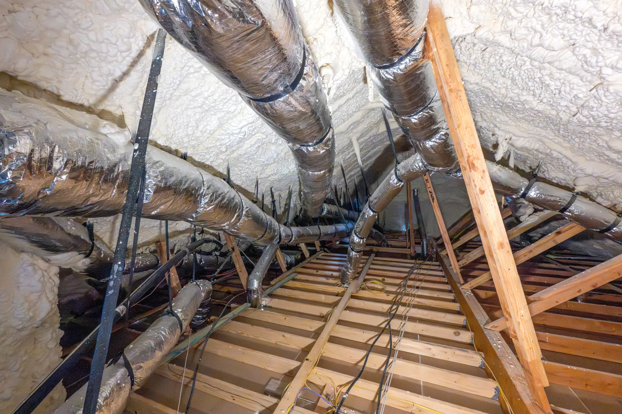 Spray foam insulation encapsulated attic in Beacon home in Edmond, Oklahoma.