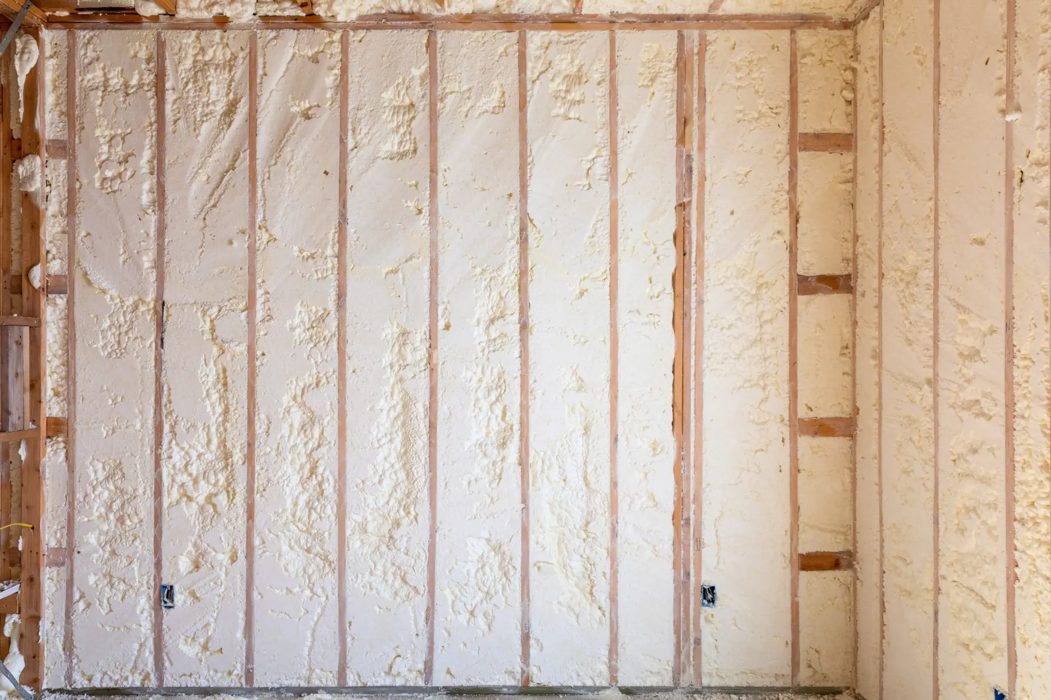 Beacon Homes house in Oklahoma with spray foam insulation and studs in exterior wall exposed