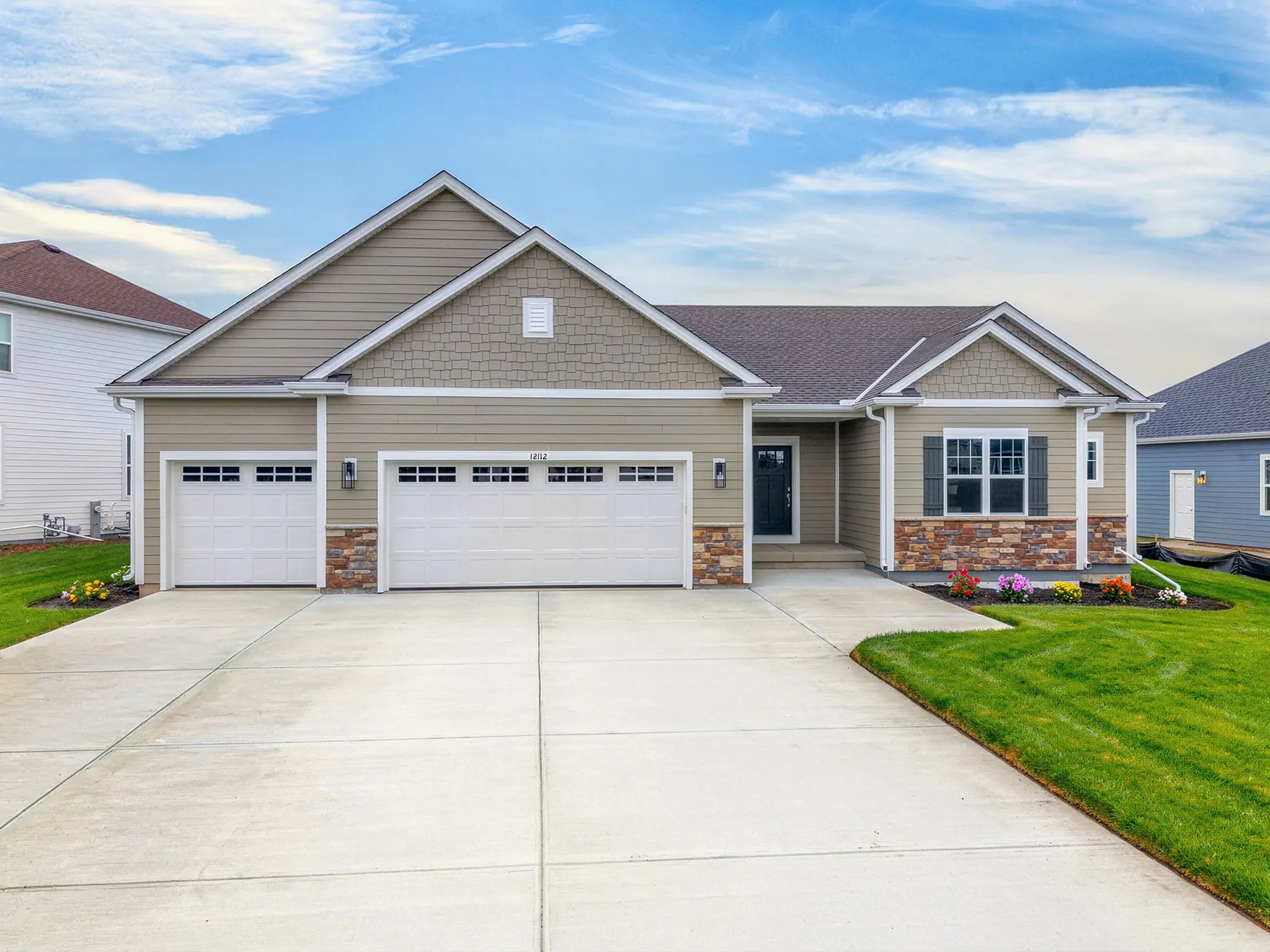 The Caspian- Craftsman Elevation 3 car garage 