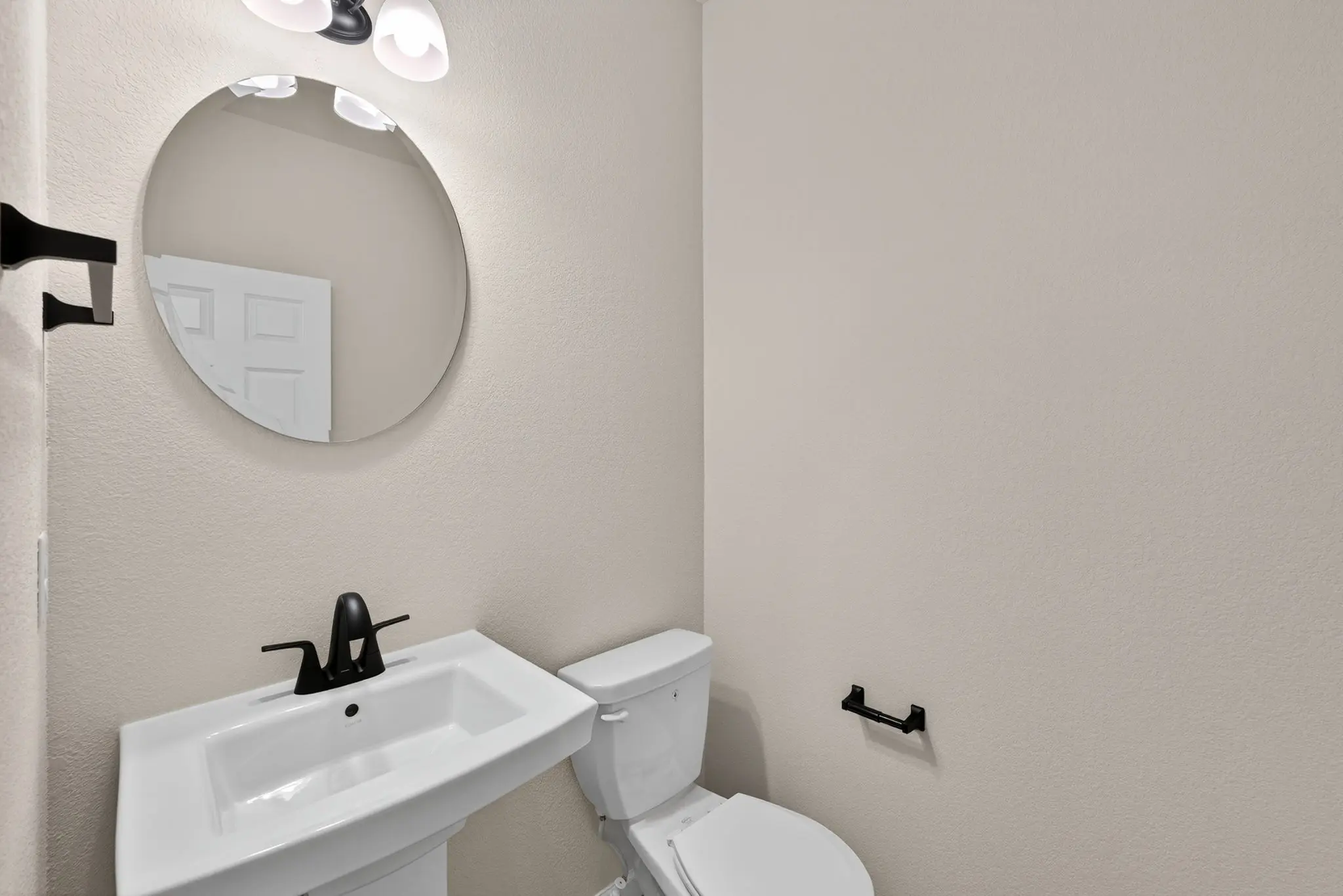 Powder Room off the rear foyer 