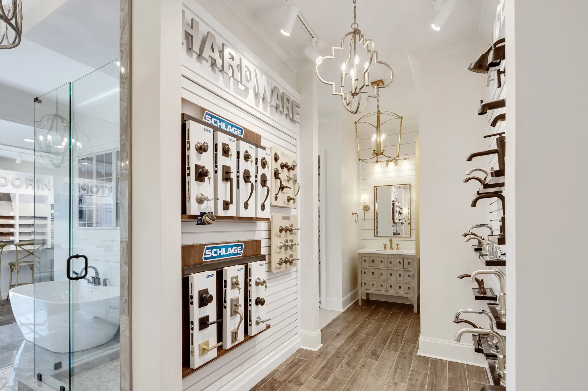 Magnolia Homes Design Center with door hardware display and stunning light fixtures for homeowners to envision.
