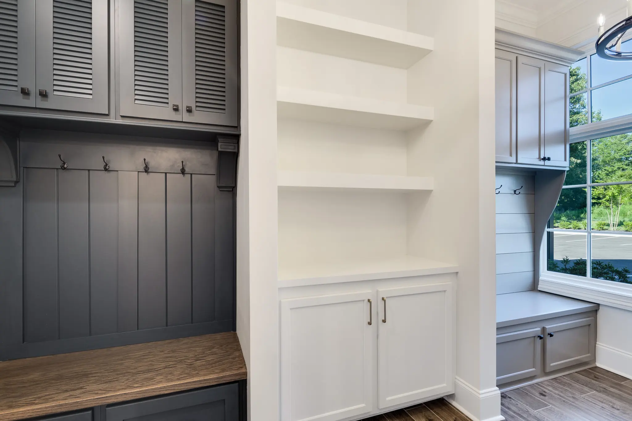 Magnolia Homes Design Center with multiple bench and hooks options and a drop off cabinet for inspiration.