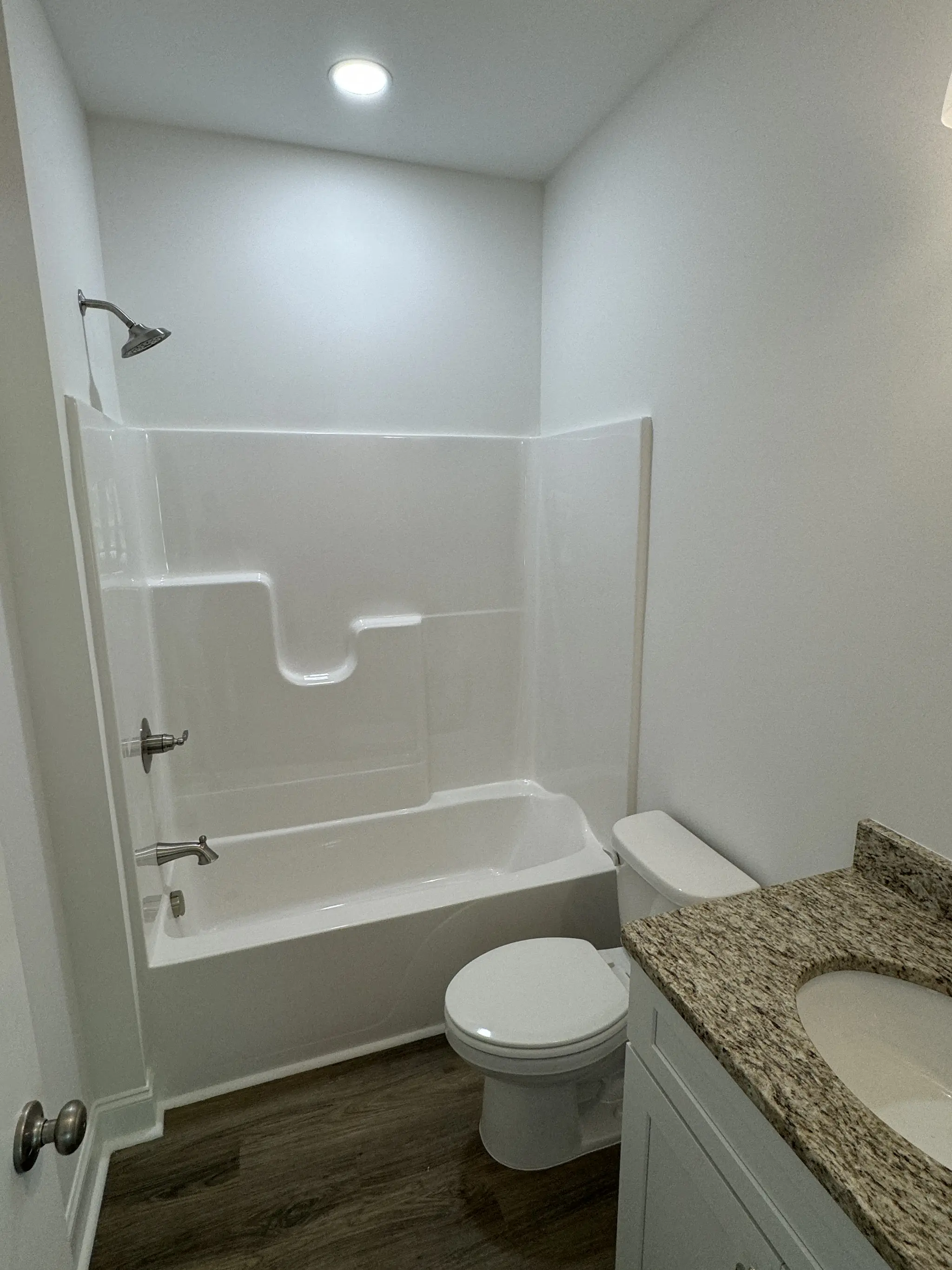 Hall Bathroom with Single Piece Fiberglass Shower Tub Combo