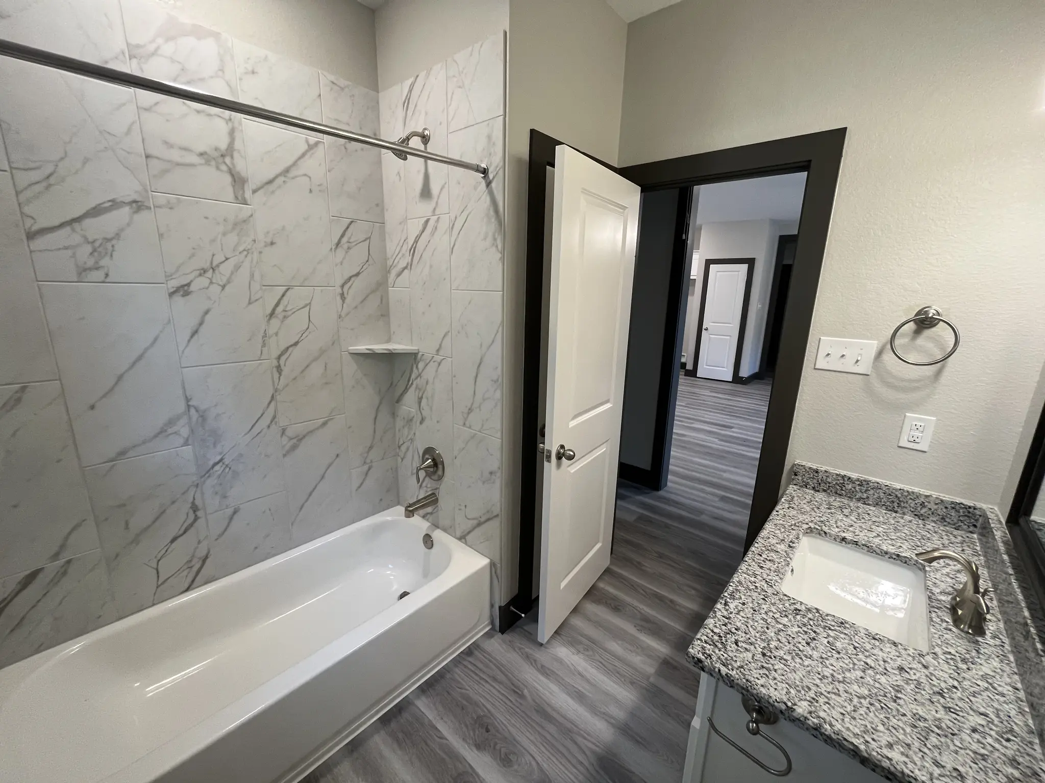 Hall Bath with Tile Surround