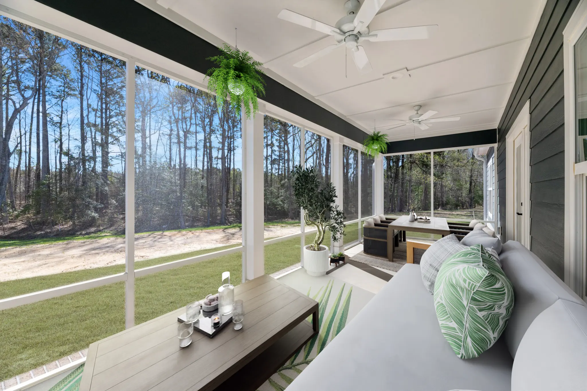 Rear with screened in porch (modified.) This image has been virtually staged.